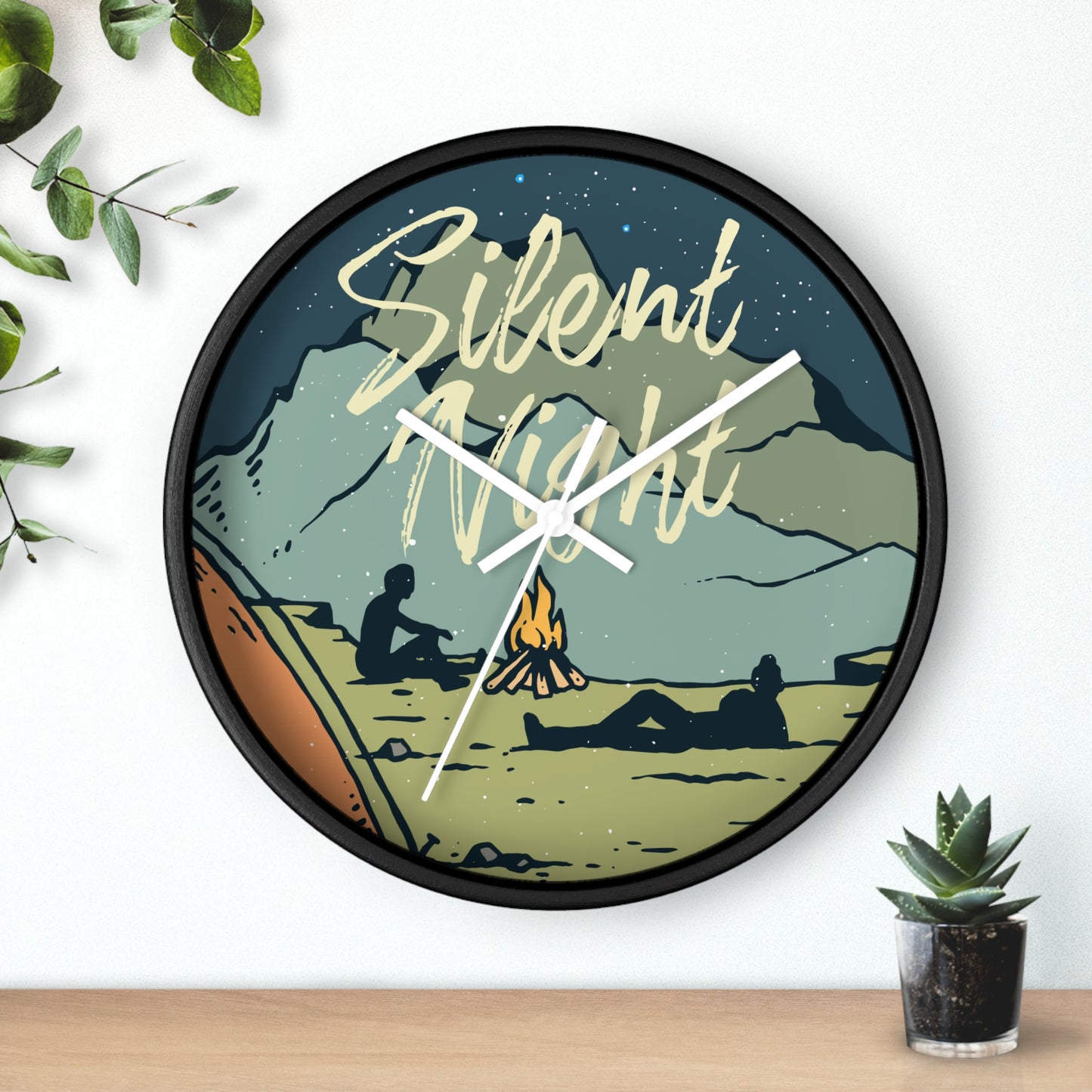Camping wall clock lifestyle photo with campfire and mountains - on the wall